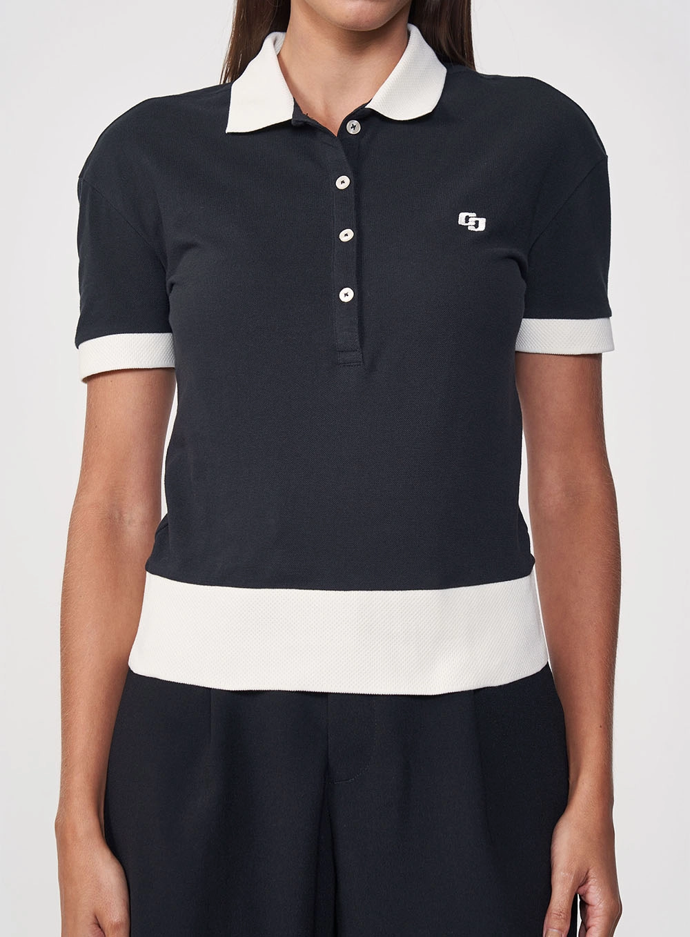 Polo Feminina Com Listras Contrastantes Preto