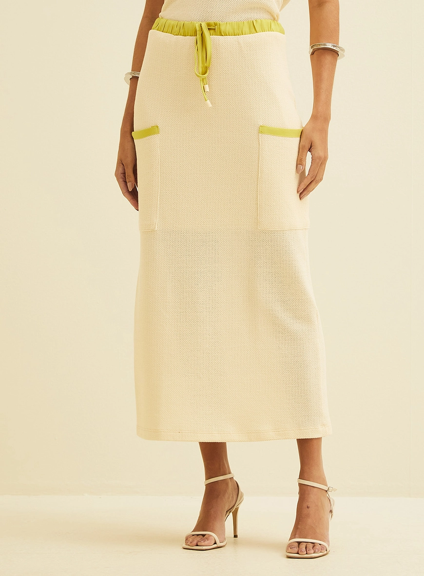 Saia Longa Reta Em Malha Tricot Com Detalhes Bege