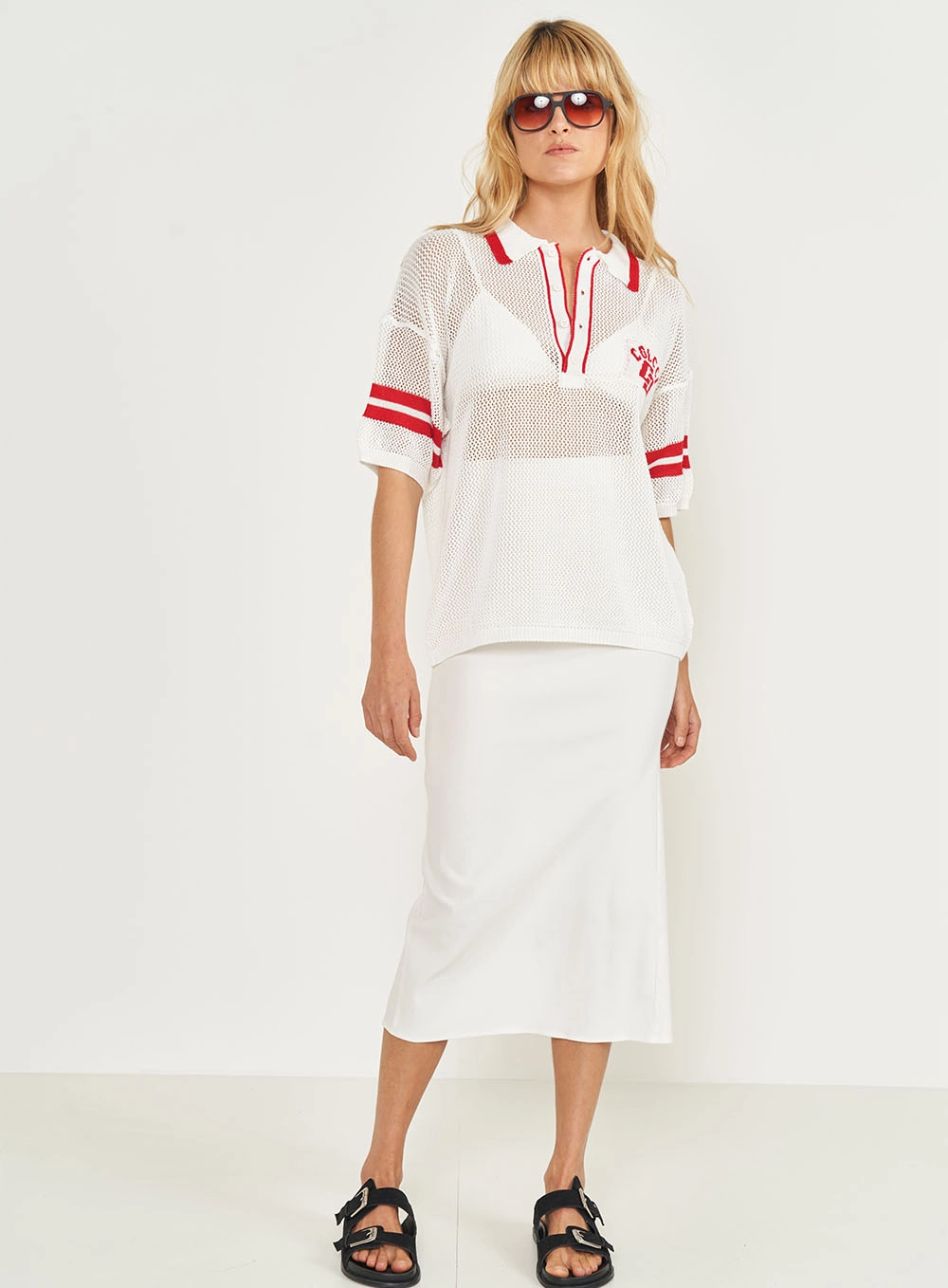 Polo Feminina Estampada Em Tricô Off Shell