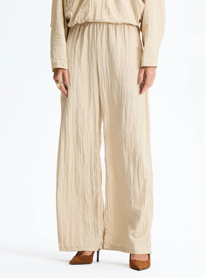 Calça Pantalona Com Textura Bege 2
