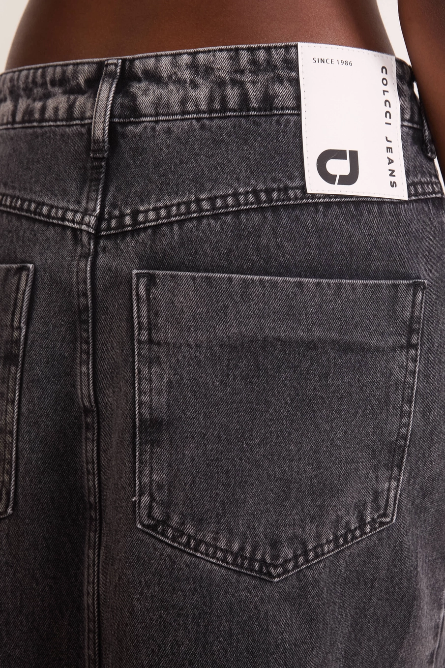 Saia Jeans Mullet Assimétrica Indigo Preto