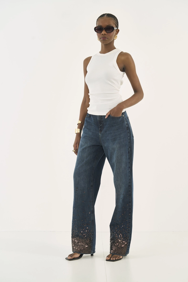 Calça Jeans Leoni Wide Leg Com Detalhe Na Barra
