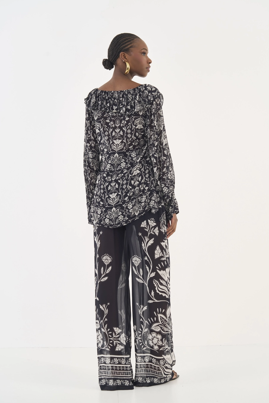 Calça Pantalona Estampada Com Transparência Estampados