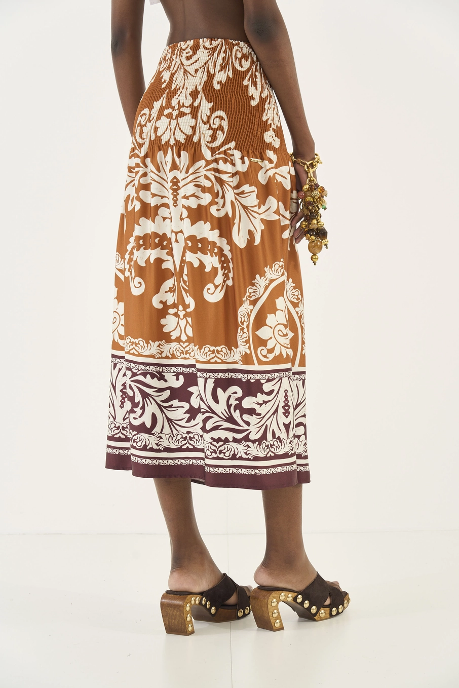 Saia Midi Estampada Com Lastex Estampados
