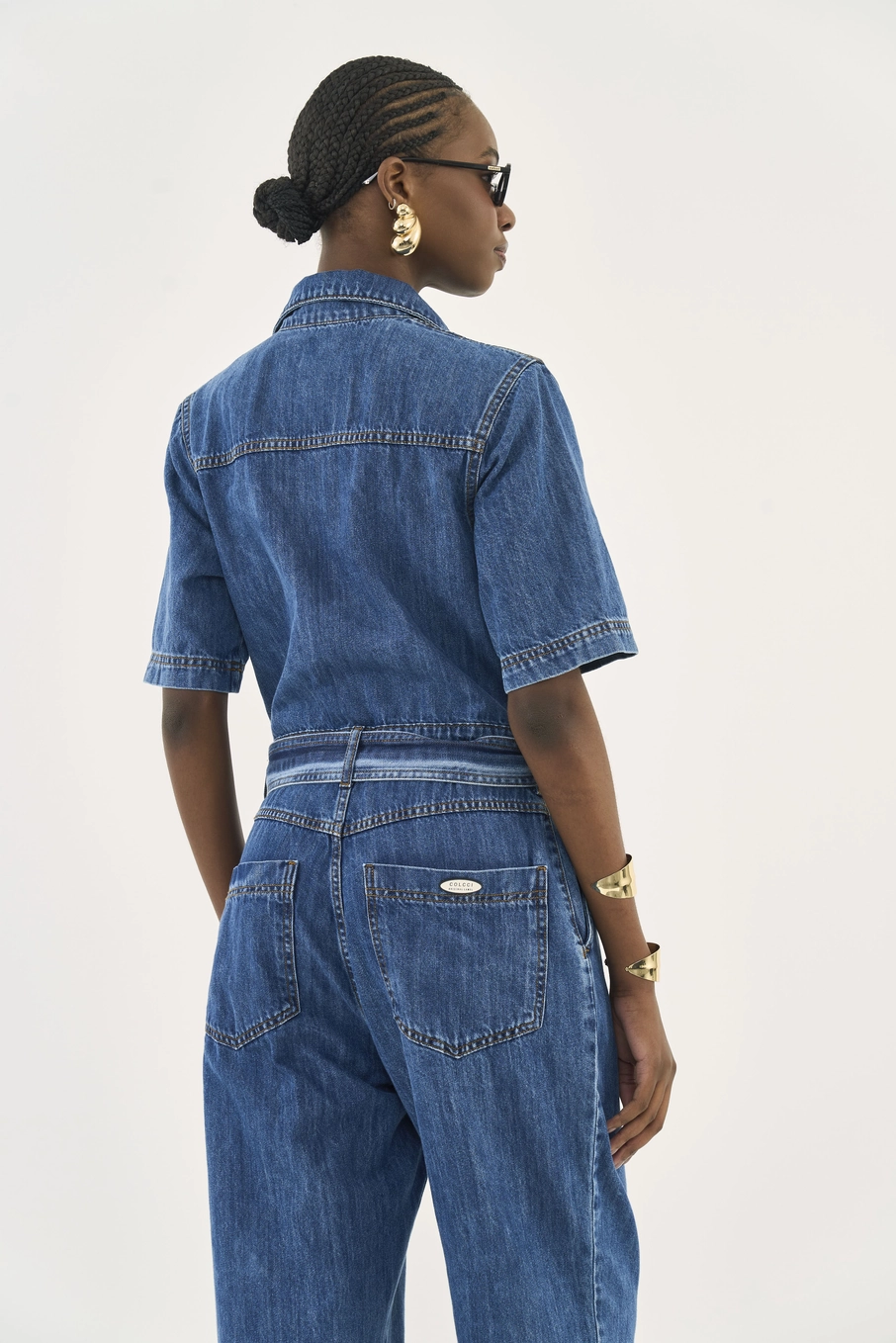 Macacão Jeans Com Faixa Acinturada Índigo