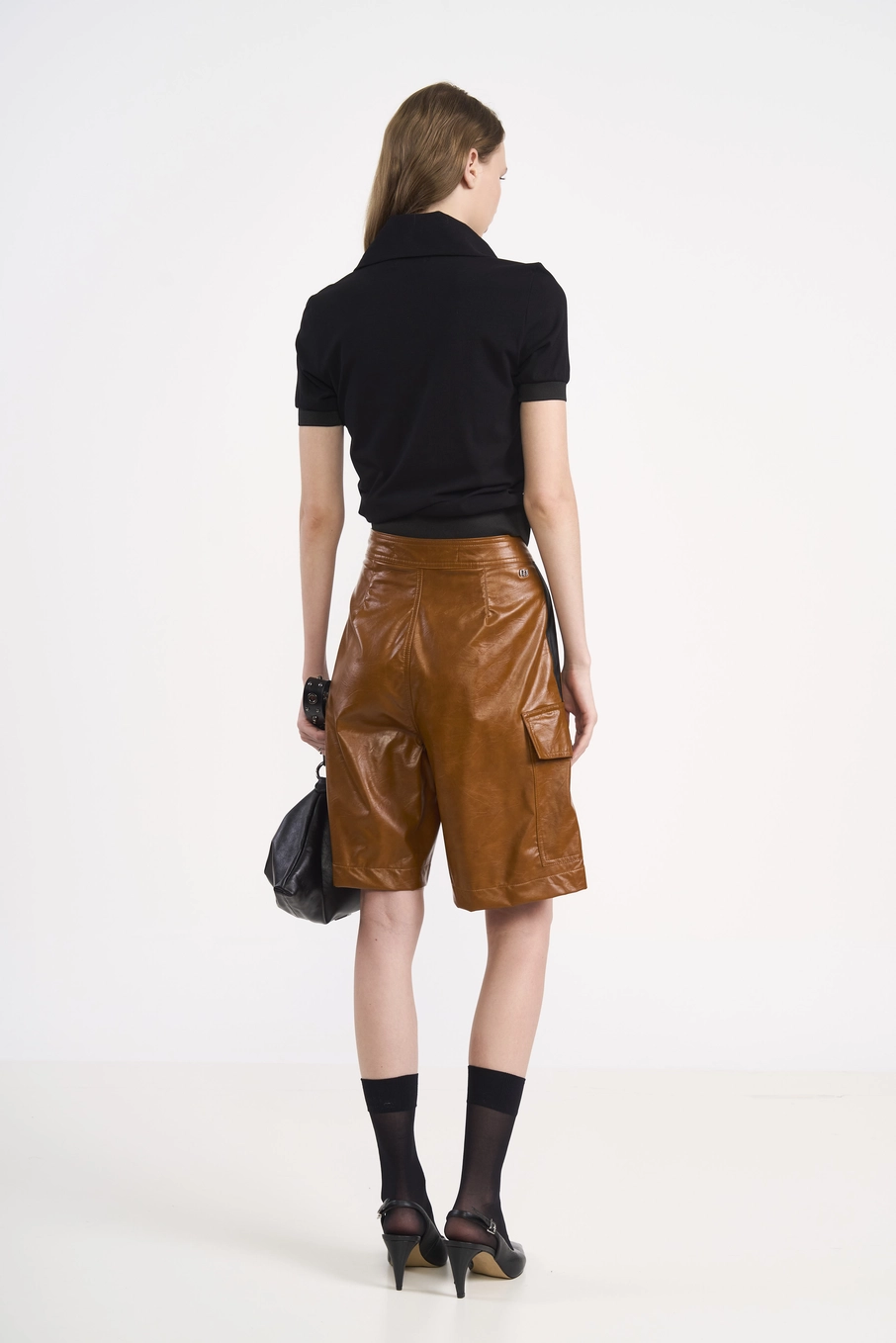 Polo Feminina Ajustada Em Malha Canelada Preto