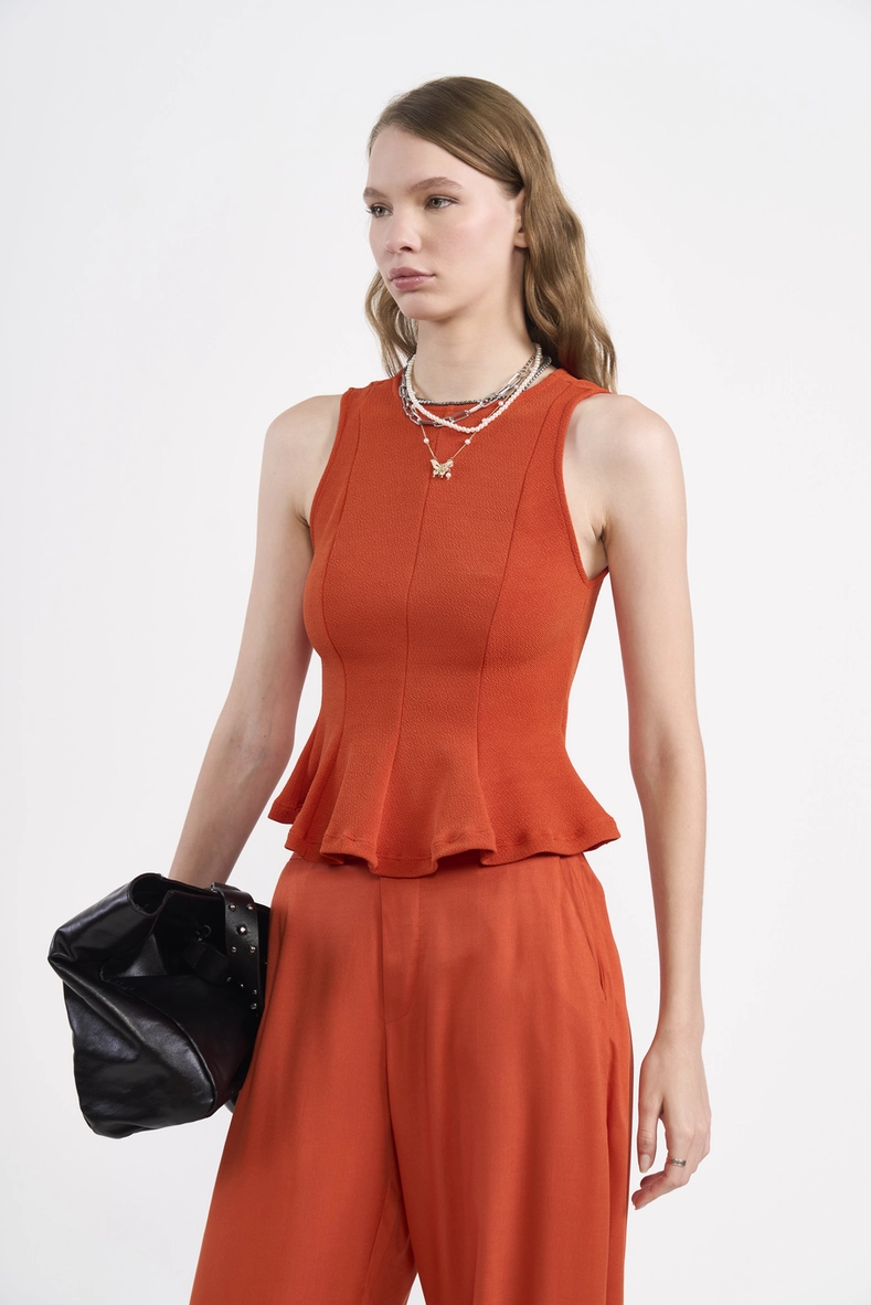 Blusa Ajustada Barra Peplum