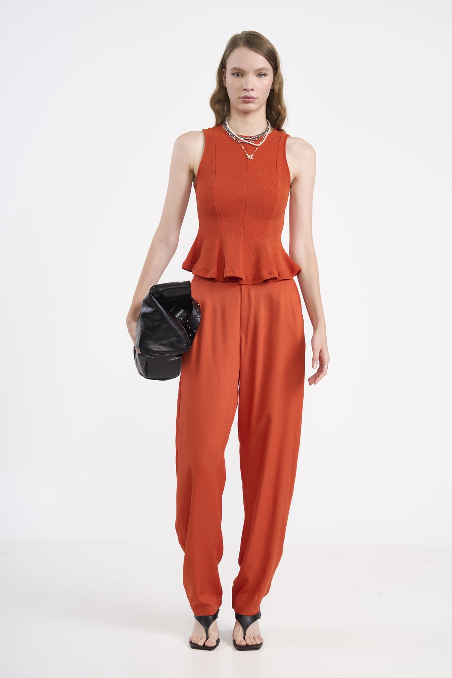 Blusa Ajustada Barra Peplum Laranja