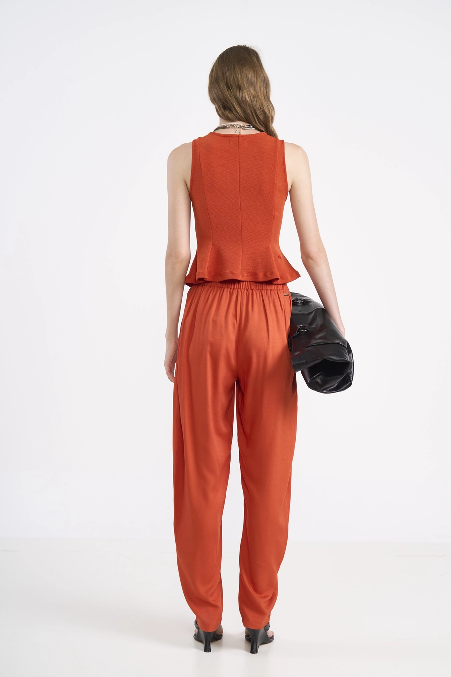 Blusa Ajustada Barra Peplum Laranja