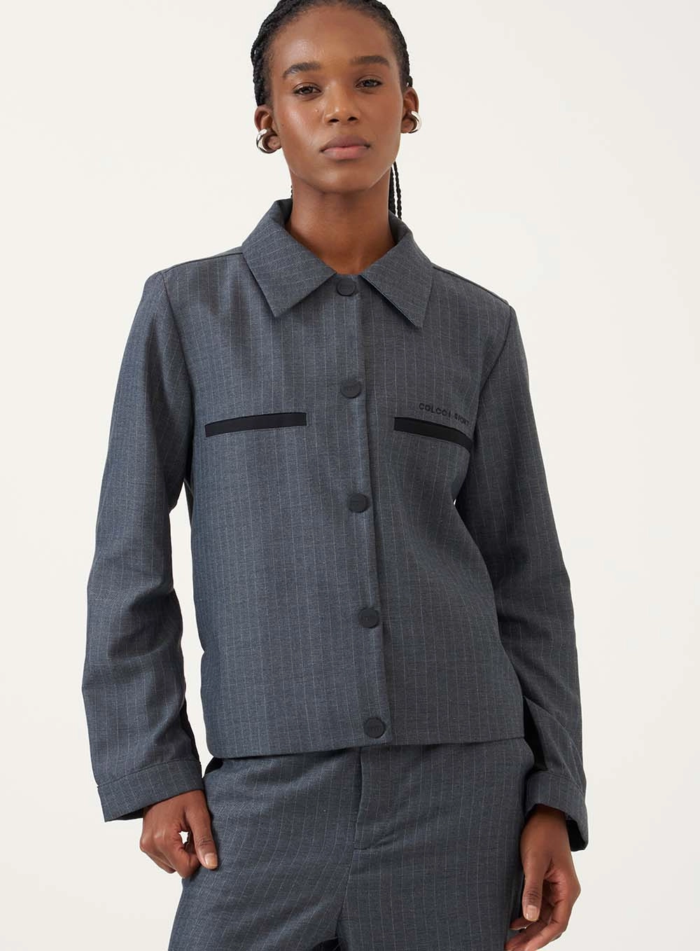 Jaqueta Oversized Com Recortes Em Contraste Estampados
