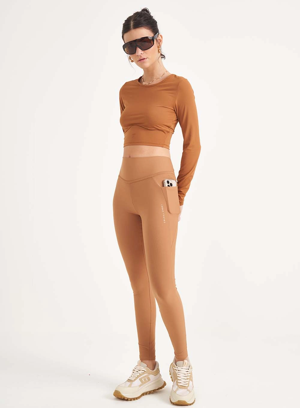 Calça Legging Sculp Com Bolsos Marrom