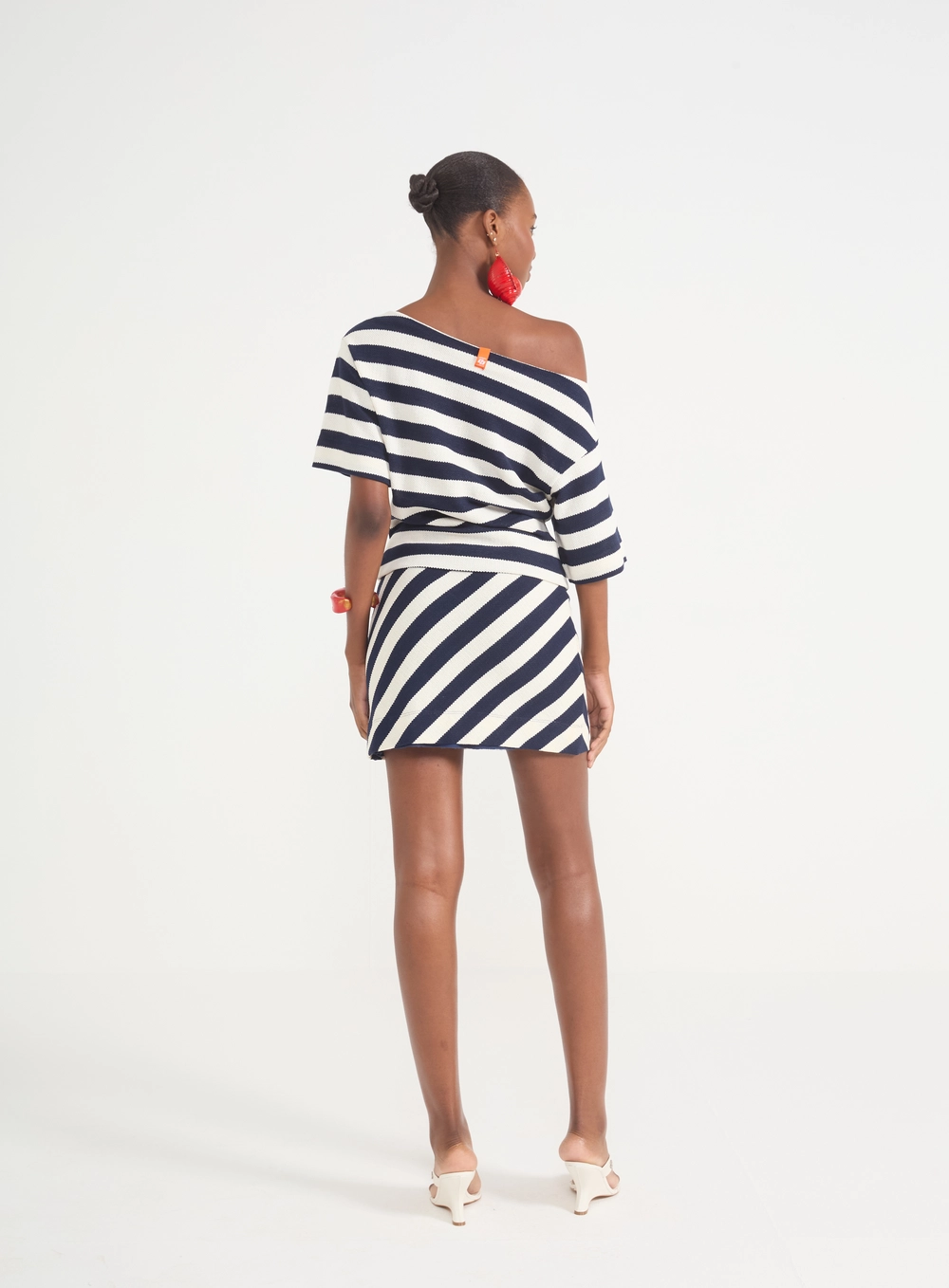 Saia Curta Tricô Listrada Jacquard Estampados