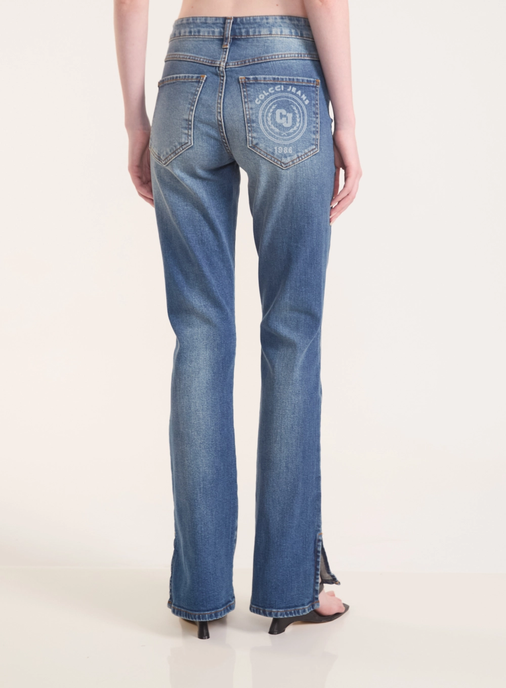 Calça Jeans Reta Nova York Com Fendas Laterais Índigo