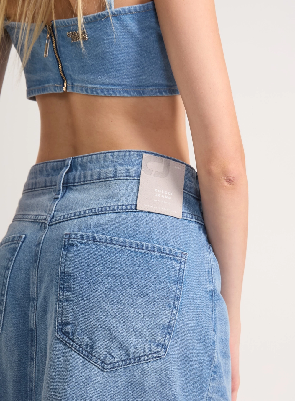 Saia Midi Jeans Com Fenda E Bolsos Índigo
