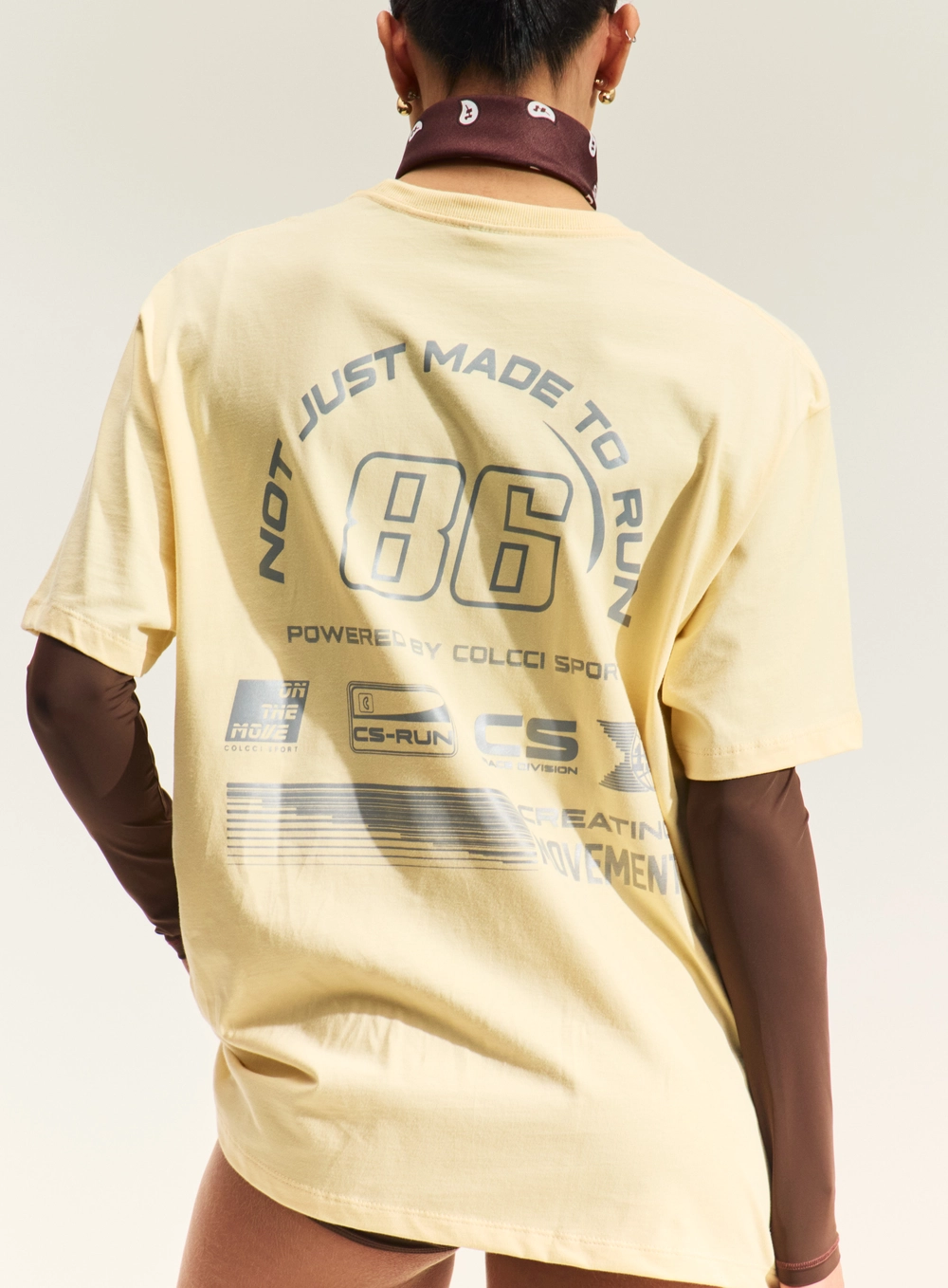 Camiseta Loose Feminina Com Estampa Localizada Bege