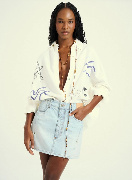 Saia Curta Jeans Com Bolsos