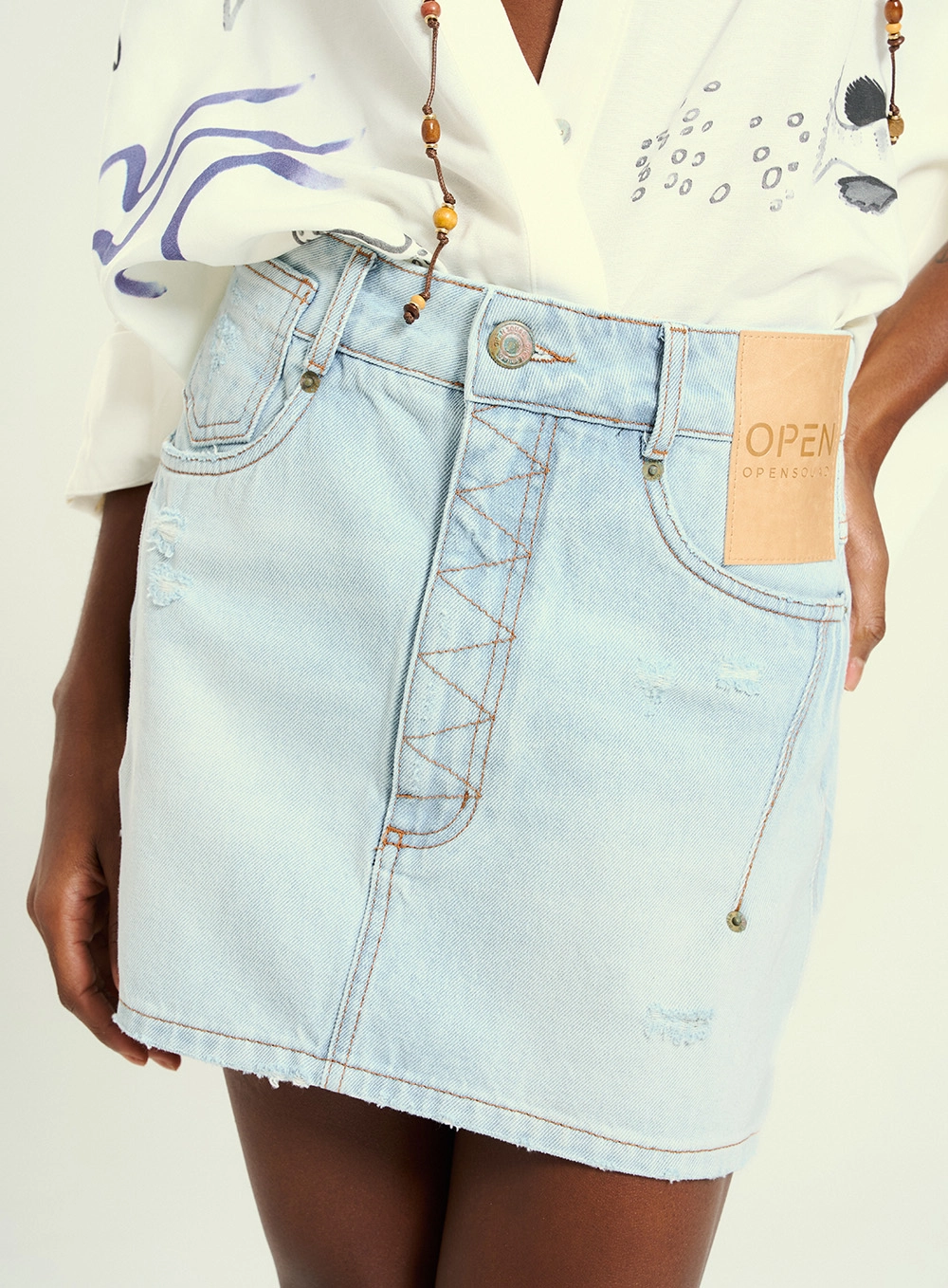 Saia Curta Jeans Com Bolsos Índigo 2