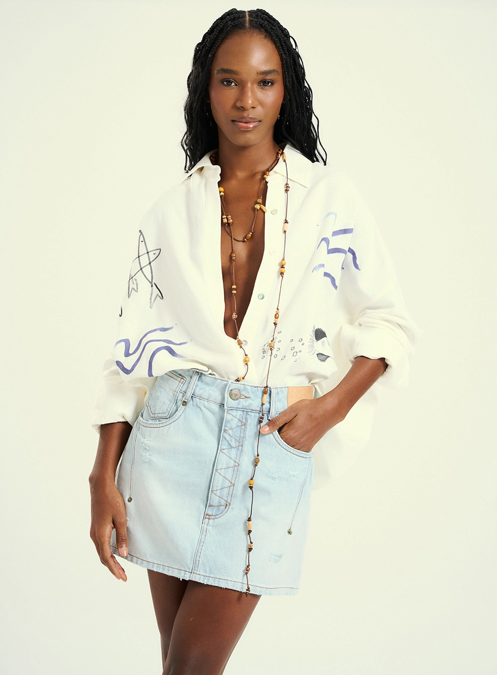 Saia Curta Jeans Com Bolsos Índigo 1