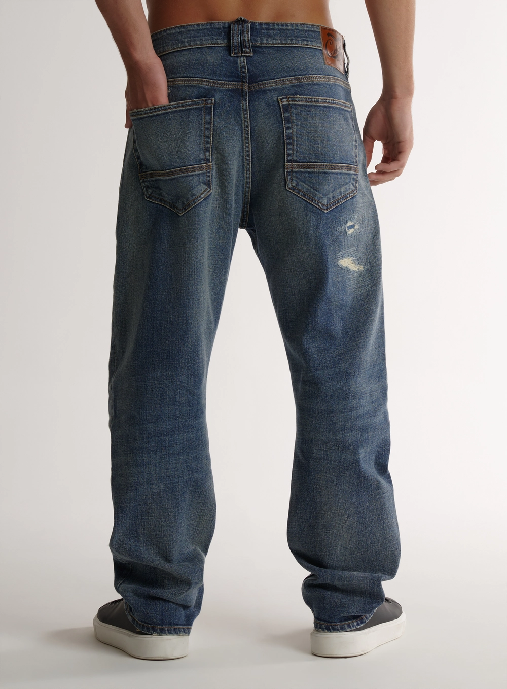 Calça Jeans Com Rasgos E Puídos Índigo