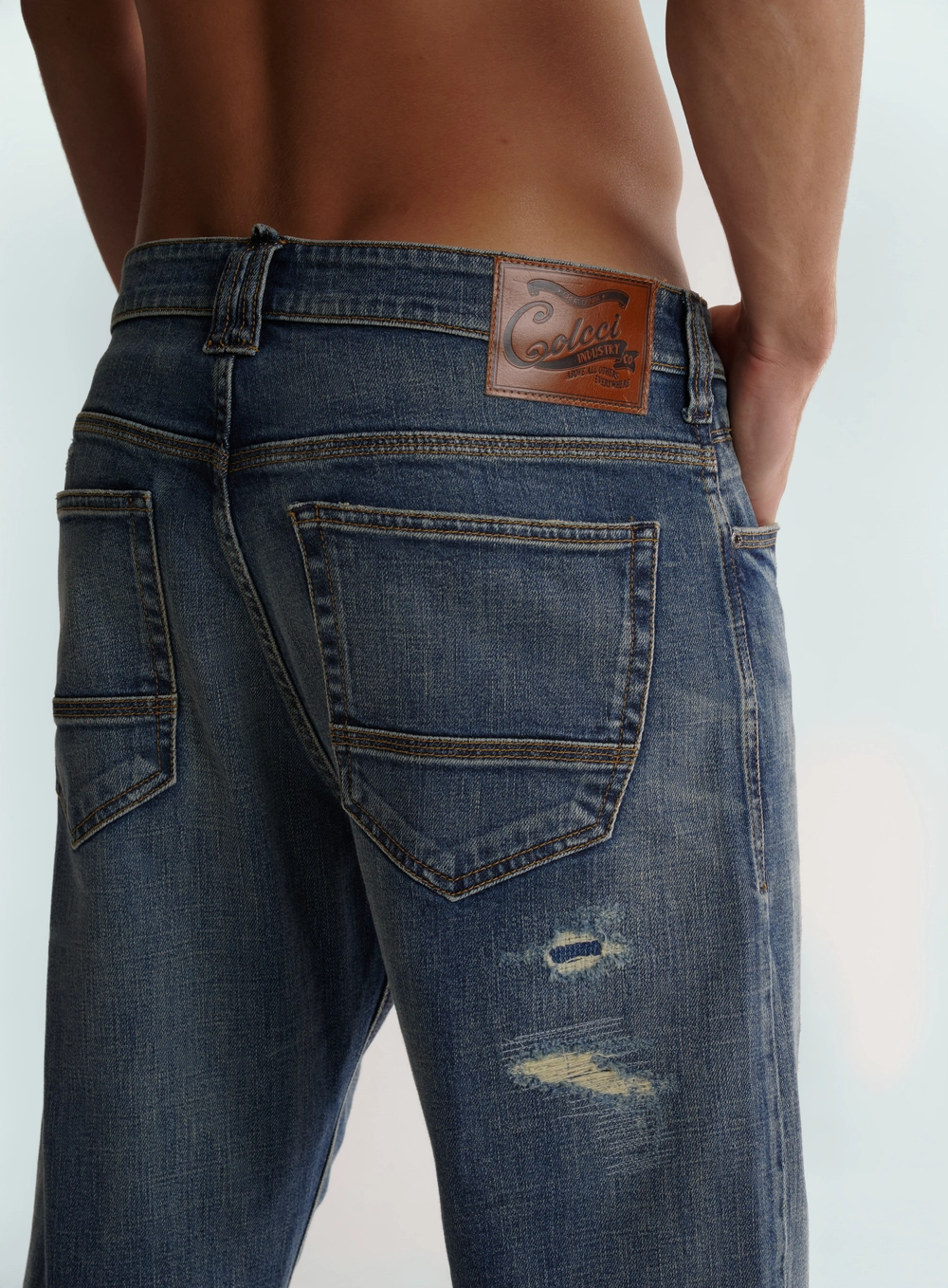 Calça Jeans Com Rasgos E Puídos Índigo