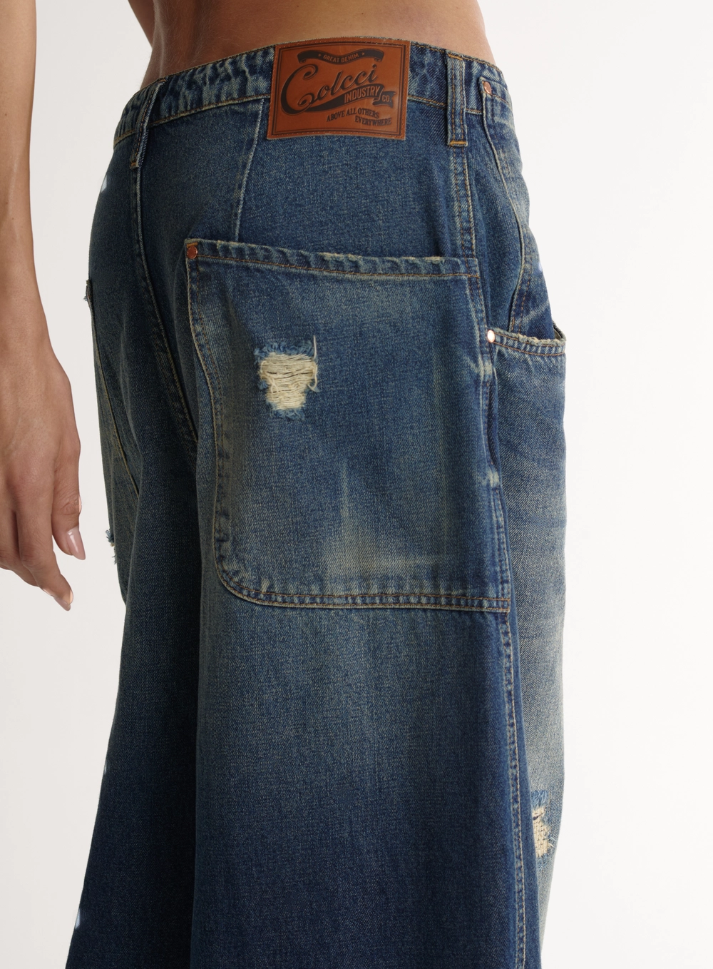 Calça Jeans Wide Leg Ampla Feminina Com Rasgos Índigo
